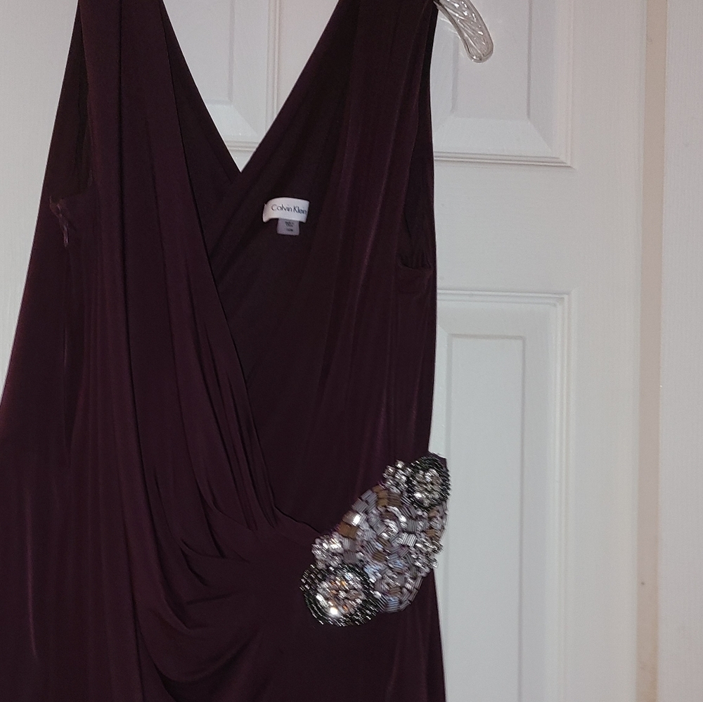 Sexy & Elegant Calvin Klein Dress with Side Ruching and Beautiful Embellishment.